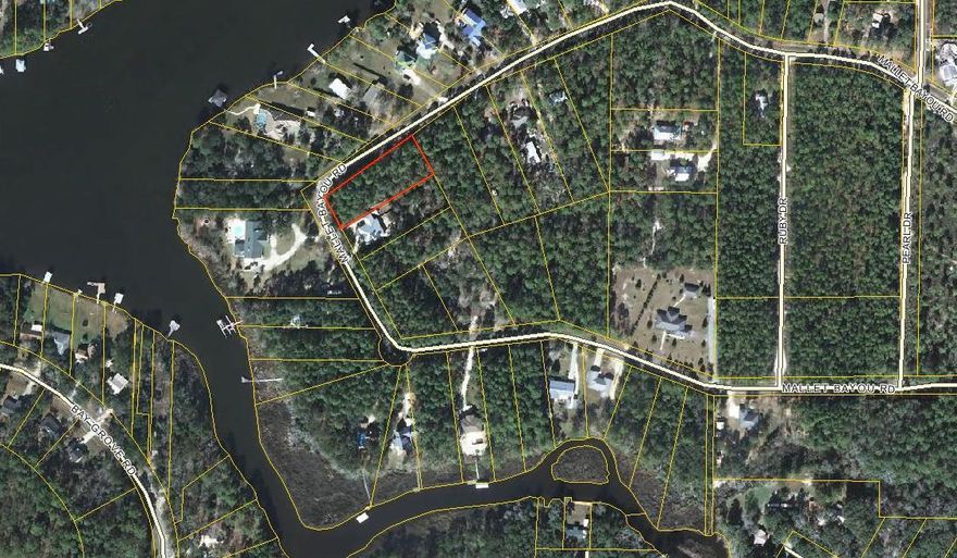 Fabulous huge vacant lot in a quiet area south of Freeport and just north of the 331 bridge. Great location near the beaches, but far enough away to be out of the crowds.