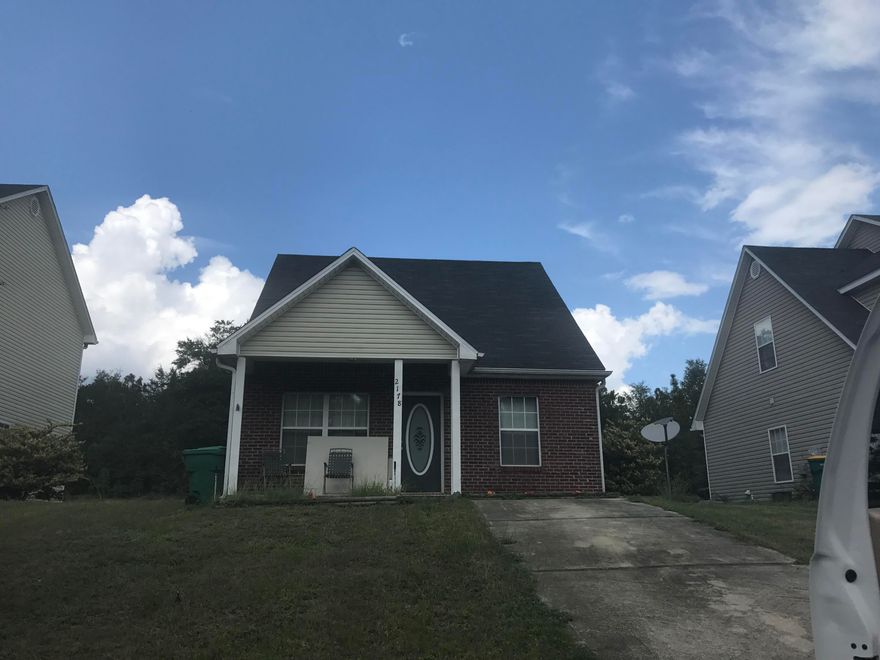 3/2 with granite counter tops in the kitchen and cultured marble in the bathrooms. Carpet and engineered hardwood floors. Newer workshop building in the backyard.