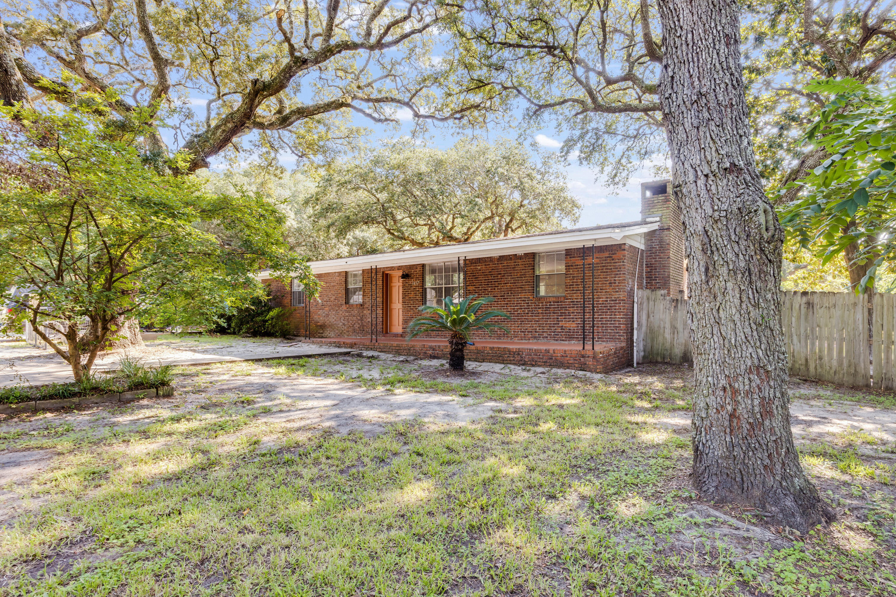 Charming 4-bed, 2-bath brick home on a 0.55-acre lot in central Niceville! This updated home features an open layout, bright modern kitchen, and stylish finishes throughout. Enjoy a spacious backyard with added privacy--perfect for outdoor living. A detached workshop provides extra space for storage, hobbies, or projects. Now vacant and easy to show! Schedule your tour today!
