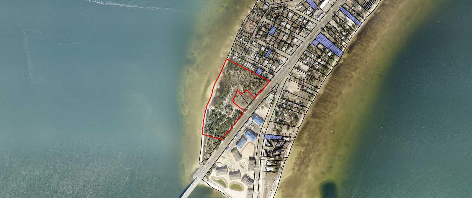 Opportunity is knocking! Fantastic waterfront development property close to Tyndall Air Force Base boasts 4 parcels with approximately 14 acres. The property boasts tons of highway frontage as well as water frontage and is located right before the bridge. Close by is a park, hotels, popular restaurants, and shopping. The site has high visibility, great access, and tons of potential. Follow the growth to Bay County Florida!