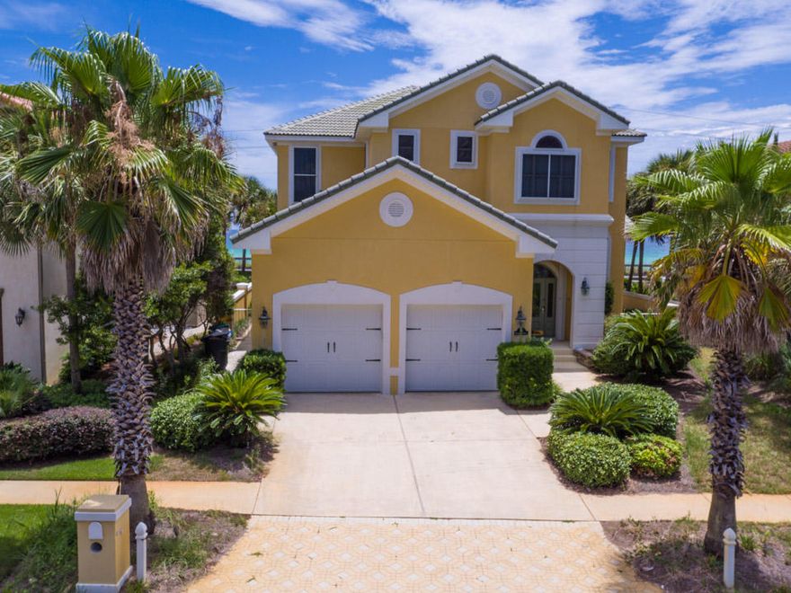 Coastal meets cozy in this dream home within the desirable community of Avalon Beach Estates. Boasting an open floor plan, plentiful natural light, unobstructed panoramic Gulf views, 2 fireplaces, courtyard with pool & more. A welcoming entrance leads you to the living, kitchen, dining area, open & connecting  perfect for entertaining. You will also find a guest suite with its own full bath. Upstairs you will find 2 more guest suites, each with its own full bath. Discover the breathtaking master suite & bath. Highlights include expansive views, balcony, hardwood floors & vaulted wood planked ceilings. Fresh new carpet & paint throughout the home. Steps from the private/gated entrance to the beach where you can enjoy nearly 500 feet of gorgeous beach frontage. Paradise!