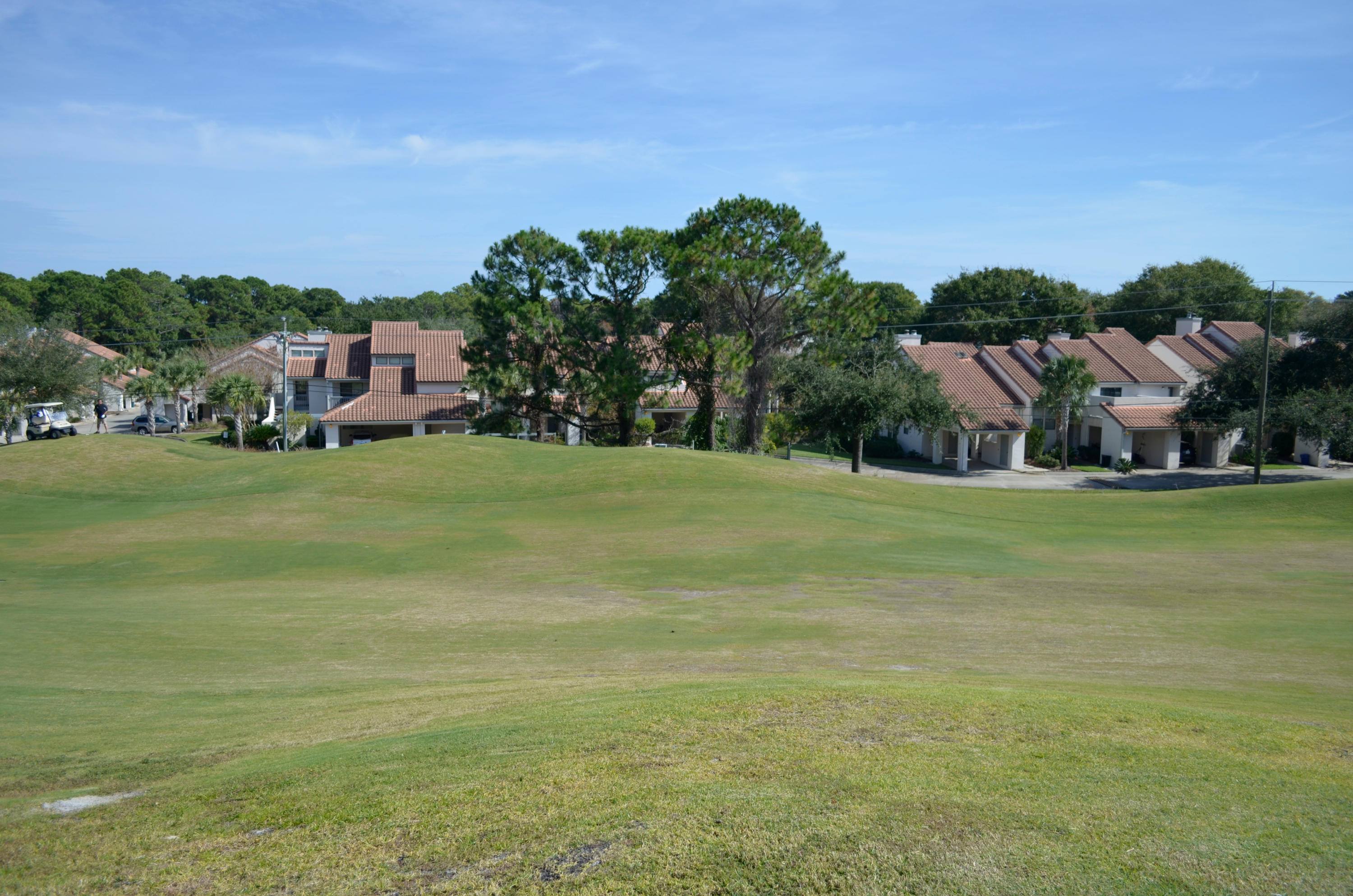 Don't miss this opportunity to own this beautiful homesite in Tivoli Ridge. Lot is situated on a high bluff overlooking the 13th fairway of Baytowne Golf course. Convenient neighborhood pool and just a short stroll to the beach and a tram ride to shopping, dining, and entertainment!