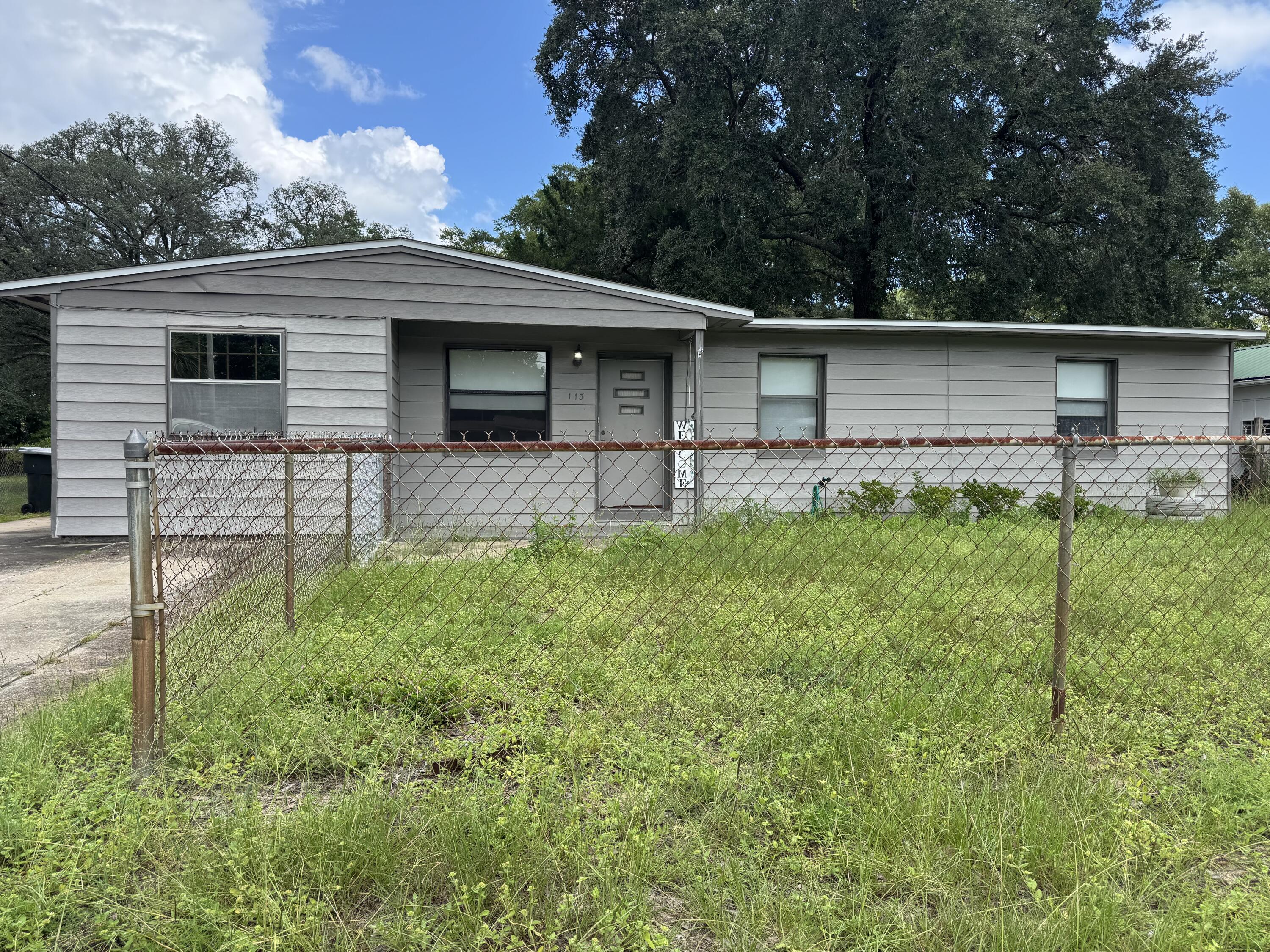Located just one block from the Intracoastal Waterway and within easy walking distance to downtown restaurants and shopping, this 3-bedroom, 1-bath home offers an incredible opportunity for both investors and first-time buyers. With a little TLC, this property can truly shine. The home sits on a spacious lot featuring two storage sheds and a large screened-in porch that spans the entire length of the house--perfect for enjoying the outdoors year-round. Whether you're looking to create your ideal starter home or invest in a property with excellent location and potential, this one is worth a look.