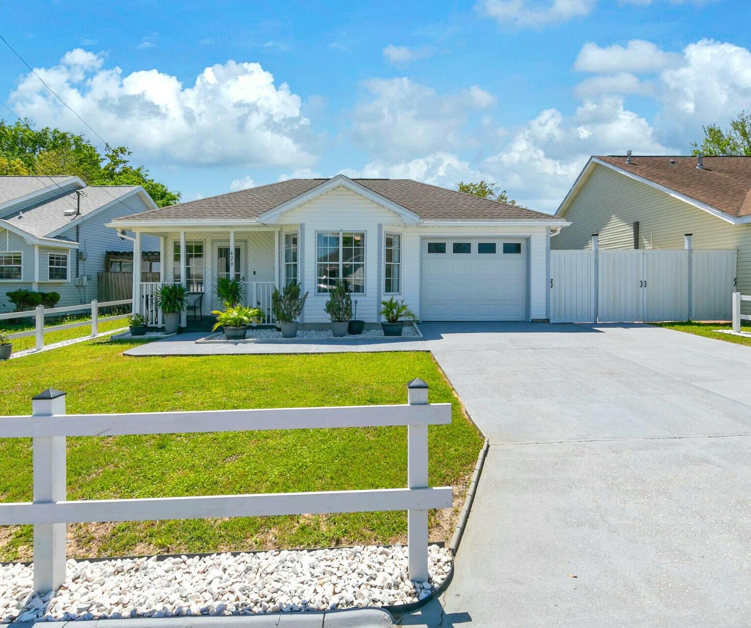 Beautifully Maintained, Turn Key, Single Story Home w/1 Car Garage & ideal location in SW Crestview! Exuding Charm & functionality, this home's 2021 ROOF, 2020 HVAC & 2020 GAS WATER HEATER provide affordable insurance & peace of mind. Charming White Picket Fence & perfectly maintained landscaping welcome you. Ample natural light & high ceilings accent the main living area which flows effortlessly into the dining area with inviting bay window. You'll love cooking in the 2022 updated Kitchen w/GAS Stove, Microwave, & French Door Refrigerator. Clean up is a breeze with dishwasher directly beside the large SS double kitchen sink. Ample white cabinets w/updated matte black handles, & backsplash detail add to the aesthetic charm. Freshly painted walls & updated light fixtures add a refreshing feel to the whole home. After a long day, find peace & relaxation in the spacious Master Bedroom, located on the back side of the home for added privacy. This room features a high cathedral ceiling with modern fan & light. The en suite Master Bathroom has been updated with a new vanity & sink, contemporary lighting, & toilet with bidet fixture. The well sized tub / shower helps you welcome a new day or unwind before bed. The home also features two additional bedrooms with ample storage. Off of the hall is a second, conveniently located, full bathroom with tub / shower. This bathroom has also been updated with a new vanity & sink, contemporary lighting, & toilet with bidet fixture. Front loading Washer & Dryer convey with the sale of the home. One car garage offers additional space for your vehicle, gym, or hobbies. Pull down stairs lead to storage space above the garage.
Looking for more space for daily activities.... Just off the living area is a Heated & Cooled Sun Room that extends the living space of the home. This sunlit space is ideal for entertaining, or the perfect office / hobby space. Venture outside for an al fresco dinner with friends & family under the custom pergola. Fully privacy fenced back yard, creates your own personal oasis. Flex your green thumb with a multitude of raised beds for you to grow your own garden. The exterior storage building adds to the functionality of this outdoor space. Large double gates on the side yard offer you the option of additional toy parking for a possible boat, wave runner, or all terrain vehicle.
Conveniently located off of PJ Adams Parkway & south of I1o, it's just 8.6 miles to Duke Field, 20 miles to Eglin Air Force Base Main Gate, 28 Miles to Hurlburt's East Gate, & 18 miles to the Regional Airport. Most importantly, only 27 miles to the Famous White Sand Beaches & Emerald Waters of Okaloosa Island! This home is conveniently located to work, play, shopping, dining, & travel on I10. Don't Miss this Opportunity. CALL Your Realtor TODAY to schedule a showing!