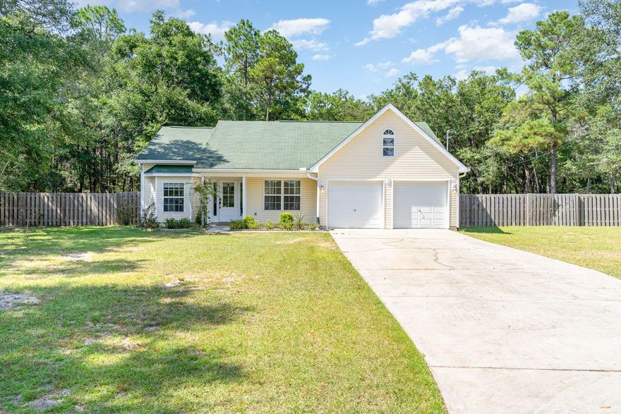 Expansive one acre lot, Farmhouse style interior remodel, new paint/flooring - this classic 3 bedroom is situated on a private cul-de-sac a few blocks from beautiful Black Creek.  Enjoy outdoor living in fast growing Freeport with NO HOA and just 20 minutes from 30A. The dining room, kitchen, and living area open up as you enter the home - with an abundance of natural light.  The home features two guest bedrooms along with a beautiful Owners Suite complete with walk-in closet.  The backyard is the perfect escape with room for a pool and plenty of outdoor living potential.  Easy show - set up your showing today!