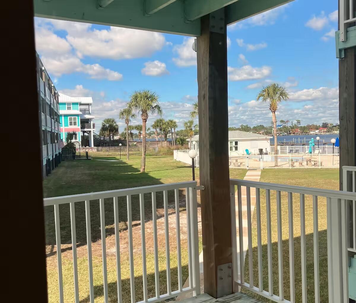 Unit D-103 at 3600 Thomas Drive is a 1-bedroom, 1-bath condo on the first floor of Treasure Cove in Panama City Beach. With 656 sq ft, it features a full kitchen, central AC, and in-unit washer/dryer. Enjoy a private balcony overlooking the pool and Grand Lagoon. Treasure Cove offers an in-ground pool, boat dock, clubhouse, BBQ area, and pet-friendly living. HOA includes water, sewer, trash, cable, pest control, and pool upkeep. Short-term rentals are allowed, making it great for full-time living or investment.