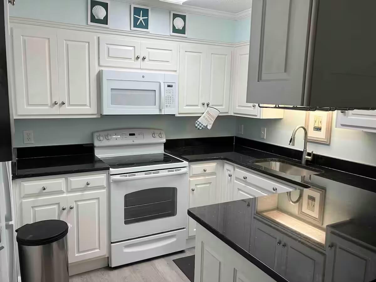 TREASURE COVE CONDOMINIUM UNIT D-103 ORB 980 P 492 1BR 1B 656 H&C ORB 4719 P 2364 - Residential