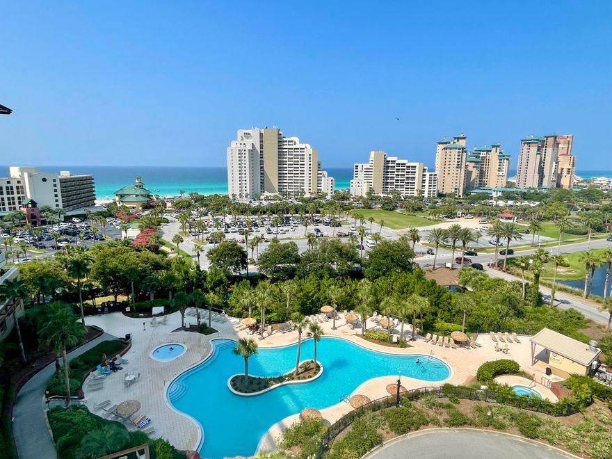 ***8TH FLOOR, SW. CORNER*** Spectacular views of the Gulf of Mexico, Golf Course, Pool and the resort from the entire condo and the wrap-around balcony make this a MUST SEE. This Immaculate unit has incredible, Luxury finishes throughout.  HVAC systems in both units are only 4 years old. Quartz Countertops/Backsplash, SS Appliances, and Custom Cabinets highlight this gorgeous kitchen.  Fresh paint throughout and new carpet in the bedrooms. The furniture is top of the line decor.  The lock-off feature allows rental as a 2BR/2BA or as a 1BR /1BA AND a separate studio. The condo is being sold fully furnished and rental ready. This unit will pull top $$ on a Rental Program! Come get a tour today!  This one won't last long!