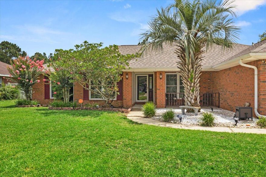 Motivated Seller's! BRING YOUR OFFERS! This charming 4 bed 2 bath home sits on a spacious .67-acre lot with no HOA! This home boasts plenty of upgrades such as a new paint, new roof as of March 2024, impact windows, newer doors, and a recently remodeled kitchen with top quality appliances and more totaling almost $100K. this home is truly a hidden treasure. Enjoy the convenience of mounted televisions in most rooms, a split floor plan, and elegant tile and luxury vinyl flooring throughout. The open concept layout features a formal dining room, a cozy eat-in kitchen with a stylish high bar, granite countertops, and a tile backsplash. The spacious backyard has plenty of room for a pool or to build your backyard oasis. Come make this beautiful home your own.