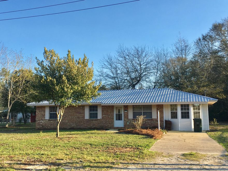 Newly remodeled home with larger bedrooms. Home now has a split bedroom floor plan. Seller has enclosed the den to make large front bedroom with bay window and exterior door; room has large closet combo with laundry room. Bedrooms on the east end of the house have been joined to make a huge master bedroom with the 1/2 bath and 2 closets. Total under roof is appx. 1314 heated and cooled area. It is a rare find to have an all brick home with 2 year old metal roof and 4 year old new heat pump, ... keep reading...HIT ''MORE'' tab TO READ ON