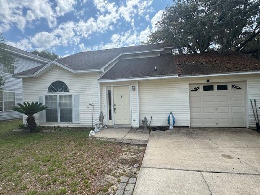 Opportunity Knocks! This diamond in the rough sits on a desirable corner lot just one street off the water--offering the perfect blend of location and potential. With great bones, this home is ready for your personal touch and vision. The spacious backyard provides ample room for outdoor living, gardening, or even a future pool. Best of all, there's no HOA, giving you more freedom and flexibility. Whether you're looking for a smart investment property or a future primary residence.