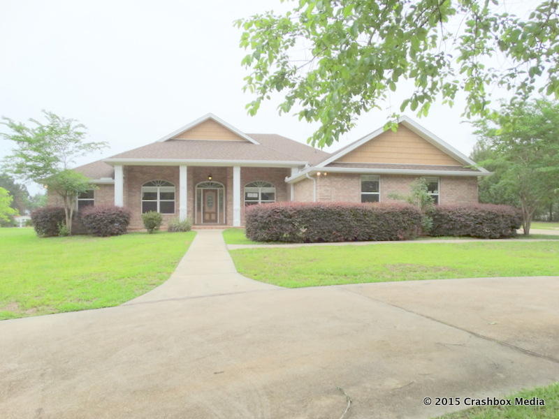 Handsome home in Crestview is stylish, spacious, and move-in ready. Upon entry you will appreciate the details in this home. The office and formal dining room are to your left and right respectively and the living is inviting you in. The open floor plan boasts a living room with fireplace, kitchen with breakfast bar, and a breakfast nook overlooking the pool area. The kitchen has new stainless steel appliances and cabinetry that is sure the impress. The master bathroom has a large closet, double vanity, jacuzzi tub, and a large separate shower. One additional bedroom has an on-suite bathroom and double closets and could be used as a second master bedroom. The property has a screened in-ground pool and large lot. Home is sold as is. All information to be verified by buyer.