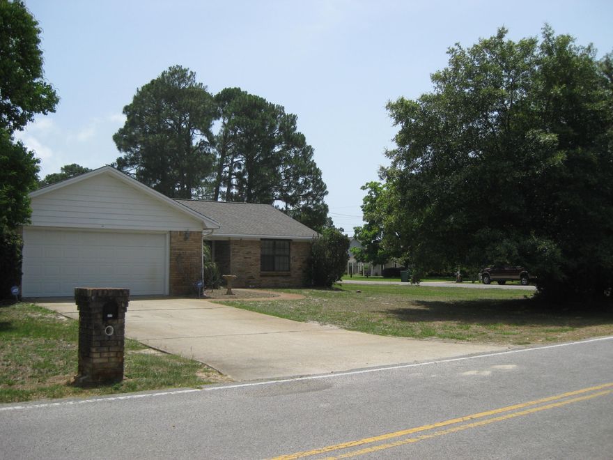 Great Neighborhood, Great Home! Situated on a large corner lot this 2085 sq. ft. 3bed/2bath home is well built and has a nice open floor plan with vaulted ceilings! There is a large open kitchen and living room looking out to the heated and cooled Florida room. All rooms are spacious and the bedrooms have large closets. There is also a two car garage. The lot is beautiful with mature trees. New ac in December