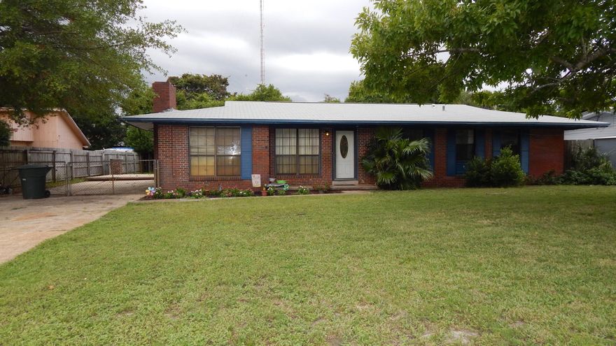 Copper Wiring! NO CARPET! 2126sf home in Central Fort Walton with 4 Bedrooms and 2.5 Baths! No Garage but Extra concrete has been poured for plenty of parking: Room for 8 cars! There are two living spaces and two bedrooms that could be used as Masters! One Bedroom has its own Fireplace! This Centrally Located Fort Walton Home is perfect for a large family or an investor. The Eat-Kitchen has Wood Cabinets, Newer Appliances/Countertop and Large (5+ ft wide) Pantry! There is a Living Room in front at the entry and then a very large Family Room in Back! There is aalso a screened patio! On one side of the home, there are three bedrooms and two full baths. On the other side, there is another Bedroom (with Fireplace!) and half bath.