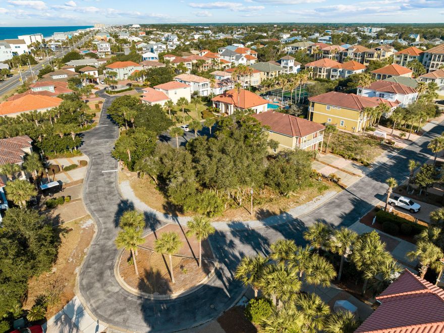 Seize this rare opportunity to own one of the largest home sites in the exclusive, gated community of La Valencia in Panama City Beach. This 0.19-acre corner lot is located on the second row, offering more design flexibility to capture stunning Gulf views from a third-story lookout.La Valencia is a sought-after, golf cart-friendly community featuring top-tier amenities, including deeded private beach access, a Gulf-front pool with restrooms, a heated community pool, tennis courts, and an owners-only clubhouse. Perfectly positioned on the west end of Panama City Beach, this property is just minutes from the shops and restaurants of 30Avenue, Rosemary Beach, and Pier Park's entertainment, fishing pier, and dog beach. Short-term rentals are allowed, making this a fantastic investment or the perfect location for your dream home.
