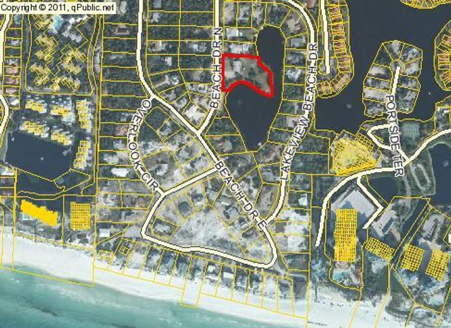 A very unique & special property with over 500 feet of Morrison Lake frontage on 1.2 acres (+/-). With it's convenient location, private beach, expansive lots, and old Florida feel, Gulf Pines is a most desirable Beach Front community. The S/D's private beach (exclusively for Gulf Pines residents & guests) offers a gated entrance along with a large gazebo overlooking the Gulf of Mexico. There's even golf cart parking spaces for those hauling lots of supplies to the beach. There is a concrete block home on the property(don't disturb tenants)but the value is in the land. With 1.2 acres, over 500' on the lake and close proximity to the beach - this truly is a one of a kind property. Drive by and see anytime but, please do not disturb tenants. We'll need to make appt. to see inside the home.