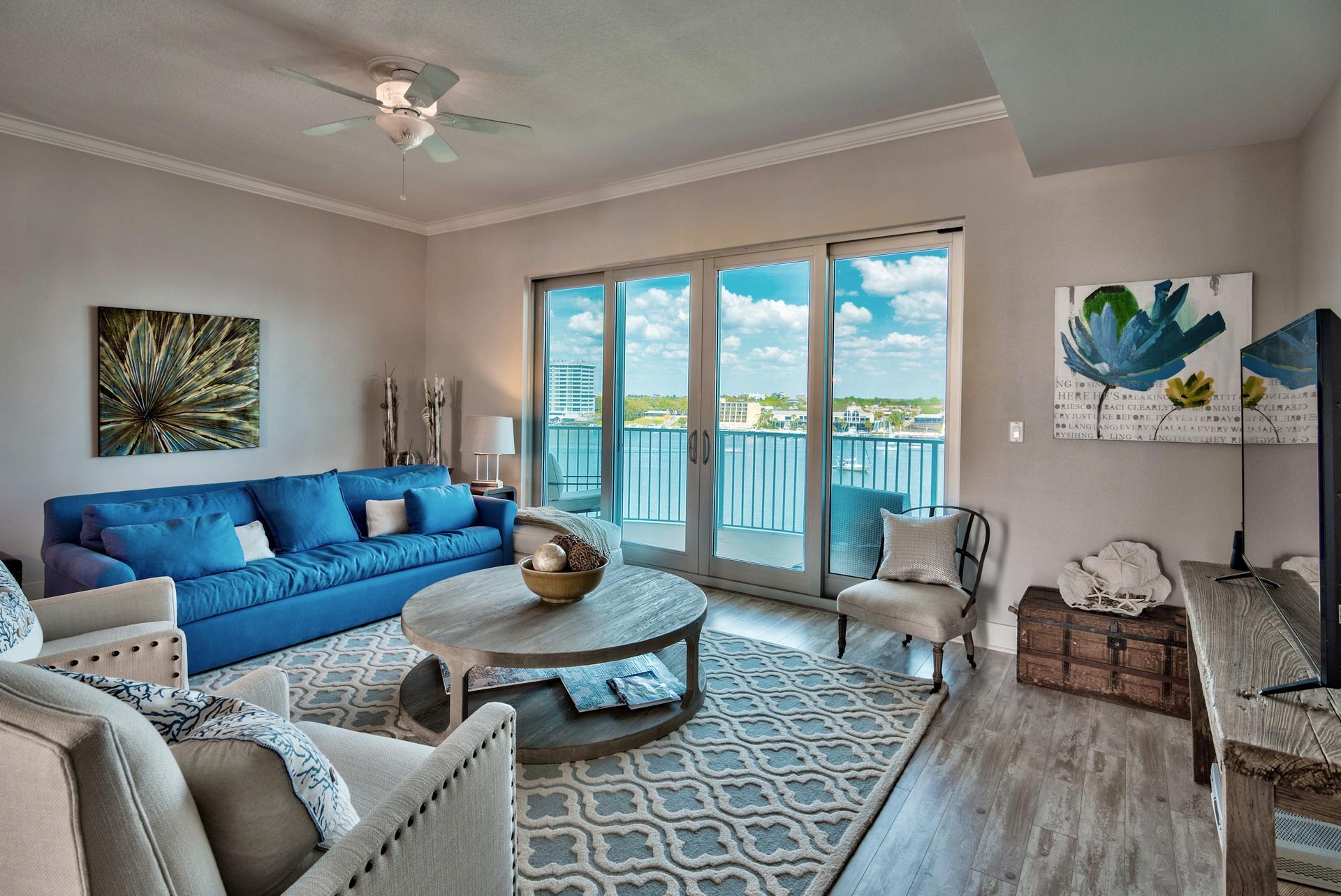 Breathtaking 2-bedroom Harbor front condo at Harbor Lights, a beautiful, prominent 7-story condominium nestled on the Destin Harbor with luxurious amenities and views. This unit has been fully renovated with brand new tile flooring throughout - great for easy maintenance by the beach. The flooring, color palette & furniture embodies a contemporary coastal feel. Upscale furniture & decor is by Restoration Hardware and exceptional! This unit is truly unique and a step above the rest. Interior features include raised ceilings (10 ft.), granite countertops & breakfast bar, crown molding (in living area & master) and an open floor plan. Boasting 1,390 sq. ft. the living area is far more spacious than most 2-bedroom condos. Enjoy incredible views of the Harbor all the way to the Destin Bridge!