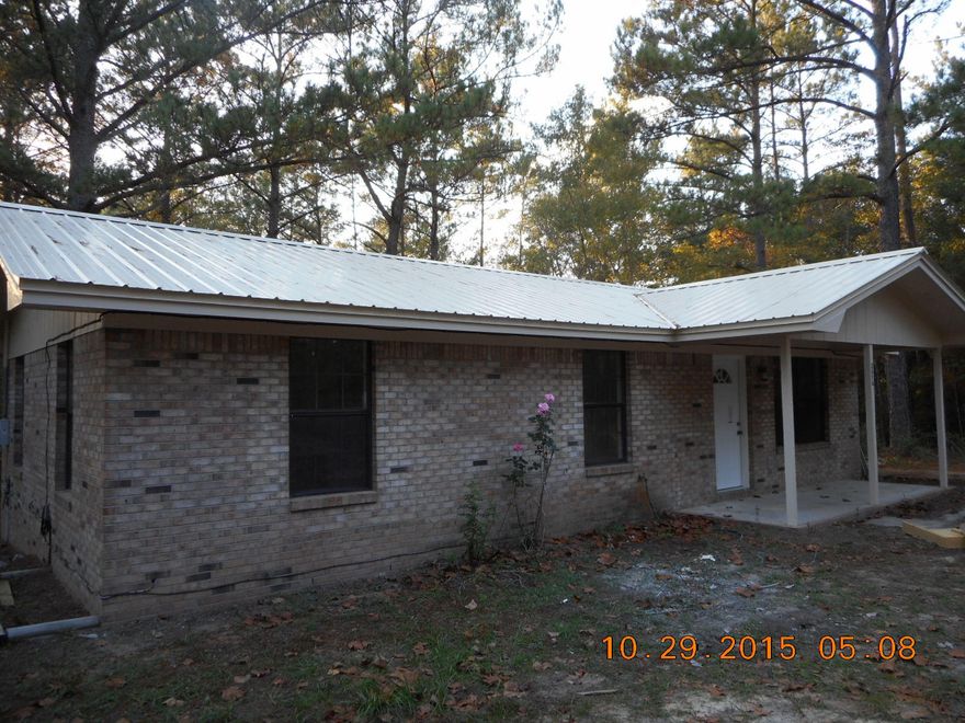 OWNER IS DOING RENOVATIONS TO HOME. Brick home in country setting with 3 bedrooms, 1 bath on 1 acre fronting paved road in Ponce de Leon school district. Home is being renovated like new including new central heat pump, new kitchen counters, stainless steel sink & faucet, new exterior doors, freshly painted interior doors, freshly painted interior walls & ceilings,new faucets & fixtures in bath, new HWH, new light fixtures throughout, freshly painted exterior. Detached shed. Home is on well and septic. This home will have new flooring throughout when done. Owner has most work completed but can finish quickly if needed. Call today for showing!