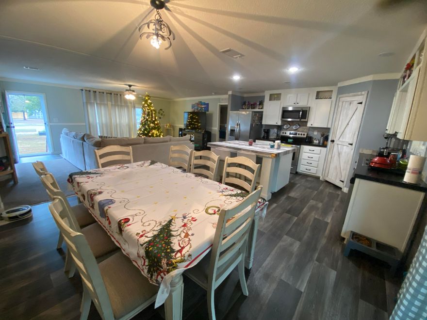 Open House this Sunday 12-2Discover this nearly new, stunningly large modular home, perfectly blending serene country living with unparalleled convenience. Situated on over an acre of pristine, cleared land, this property offers the space and tranquility you've been dreaming of, all less than half a mile from Highway 90. Step inside to find a meticulously designed interior boasting well-appointed finishes throughout. The spacious, open floor plan features modern amenities and elegant touches that create a warm, inviting atmosphere for both everyday living and entertaining. Outside, the expansive grounds provide endless possibilities, from gardening to recreation. Pet owners will delight in the large, pre-installed dog run.