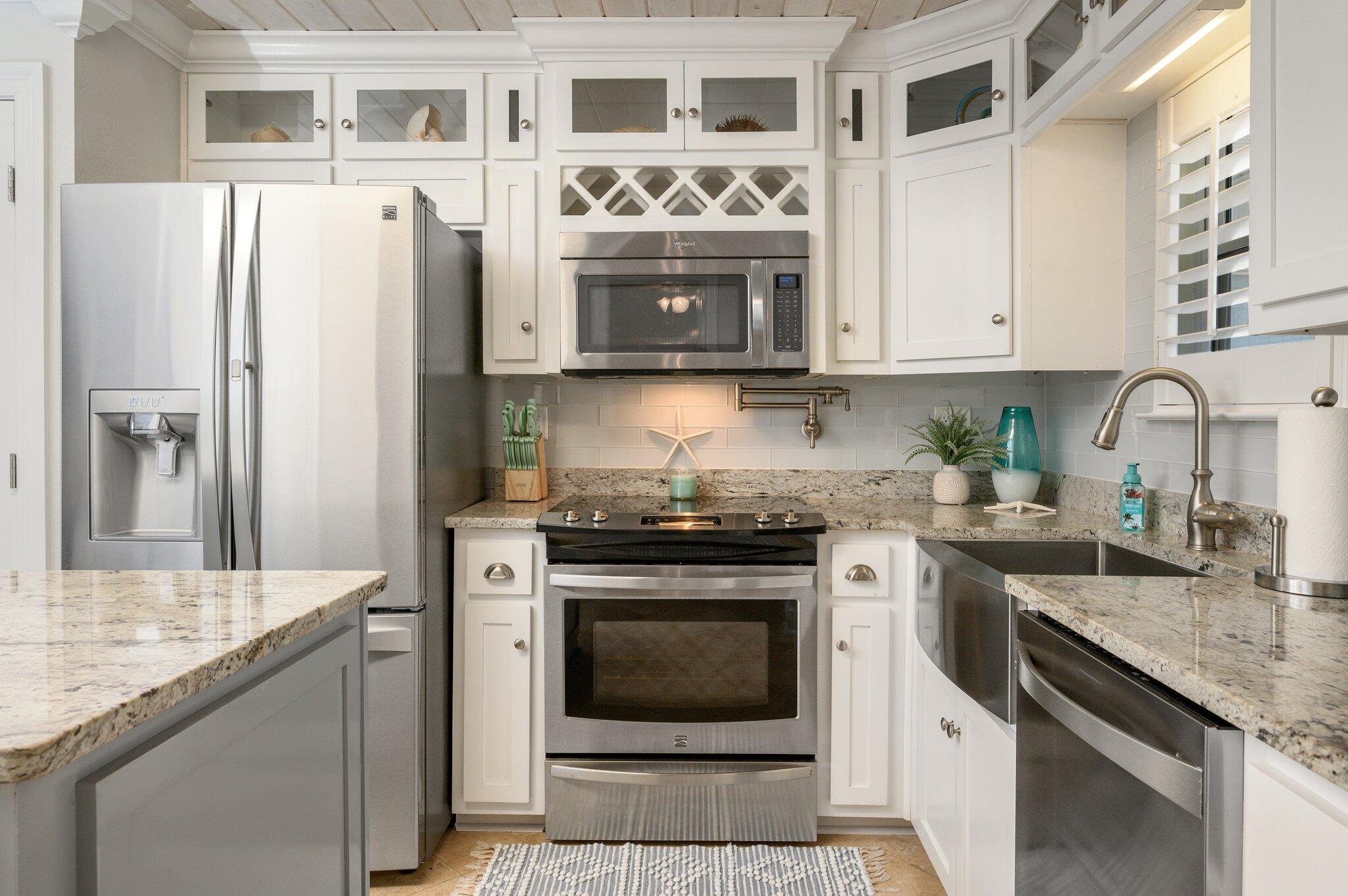 BOAT SLIP AND LIFT!! Relax in the tranquil setting of this recently refurbished 2 BD/2BA condo! The unit is located on Choctawhatchee Bay w/ public Gulf access across the street to the world's most beautiful Sandy white beaches and emerald waters and a short 5 minute boat ride to the world famous Crab Island. The complex is tucked away from the main highway creating more of a sense of seclusion. The unit comes with a deed boat slip and boat lift as well as full access to the pool which have bathrooms for usage by both owners and their guests. The condo itself is beautifully decorated to reflect a serene coastal setting! The unit comes completely furnished and features an open floor plan with beautiful white upgraded cabinetry (glass doors and lighting on the upper most cabinets),