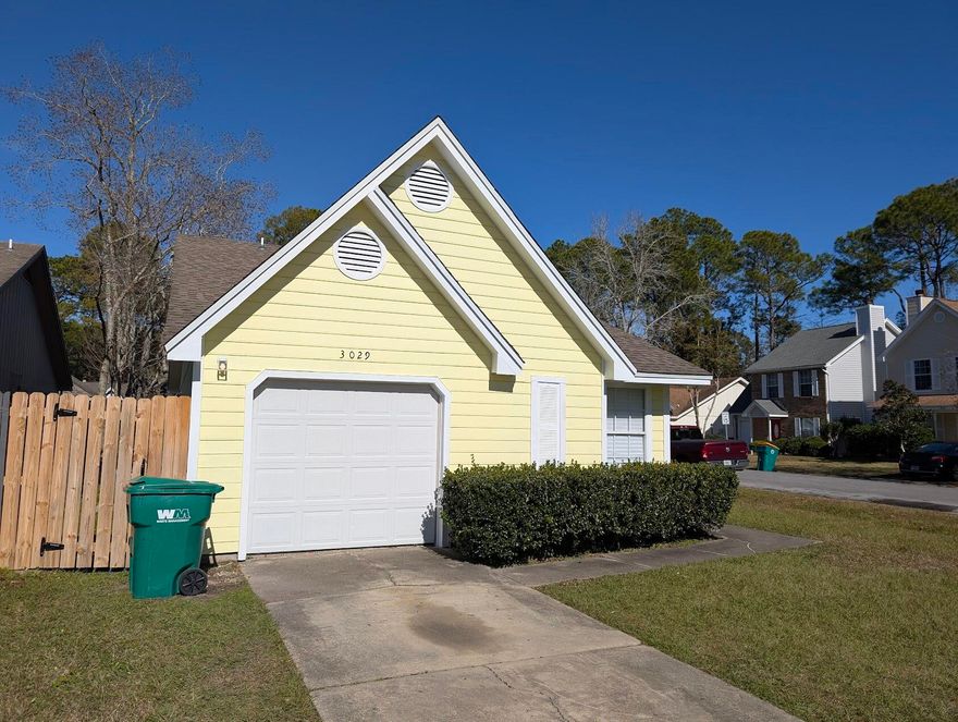 Charming house with some great features! Real working wood burning fireplace. High ceilings can really make a space feel open and airy. An eat-in kitchen that's open to the great room is perfect for entertaining or family gatherings. Fresh paint and new flooring are always a plus, giving the home a fresh, updated look.