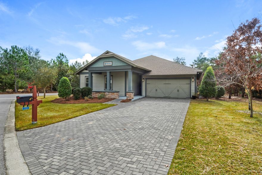 Stunning home situated on the 1st hole of the Wild Heron Golf Course. Built in 2013 no detail was overlooked by the owners. Upon entering the home the first thing you will notice is wood-styled, tile floors throughout. This split bedroom home offers three bedrooms at the front of the home, while the master suite is located off the living area and also includes beautiful views of the golf course. If you like to cook or entertain, this is the kitchen you've been dreaming of. A chefs kitchen offers a massive, marble topped center island, Viking 5 burner gas range with hood vent, dishwasher, microwave & pantry. A 12' sliding glass door allows the living room to open up to the screen porch. Enjoy sea breezes on cool days, or close the door and just enjoy the view through a full wall of windows . Situated on an oversized corner lot you'll be provided with ample privacy including a wooded buffer between the home and the golf course. Natural gas is utilized for the range, hot water heater, central heat, as well as a stub for an outdoor grill. This is not your typical Wild Heron home and one that is a must see to be truly appreciated.  