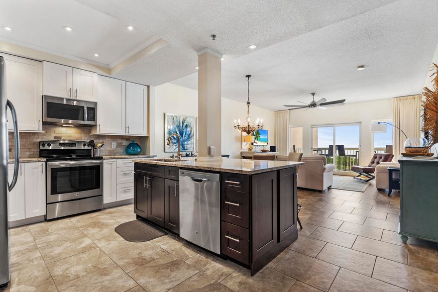 Beautifully updated with a new kitchen that has been opened up to take full advantage of the this units' natural light and gulf views.  With new cabinets, countertops and a welcoming, open-concept kitchen, this unit is a wonderful place to call home for a day, week or for a lifetime of memories at the beach.  New tiled showers and updated bathroom cabinets round out this great unit. With a sixth floor view on the front of the building, you will have Gulf views from the living room and main bedroom over Four Mile Village and the surrounding area.  This unit is currently on a rental program, being sold fully furnished and turnkey ready.