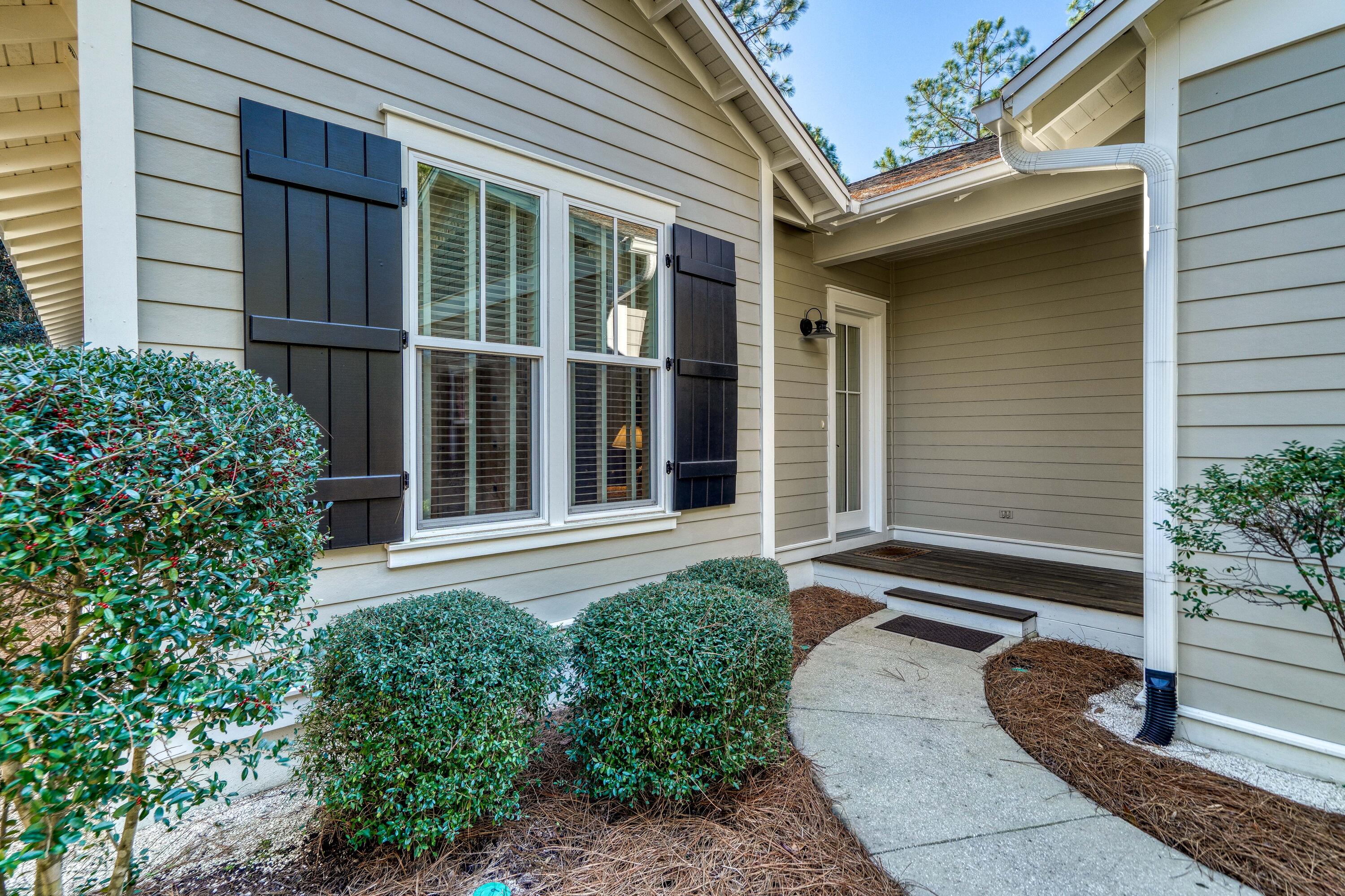 Exquisite 4 bedroom home located in the secluded Winter Garden section of WaterSound Origins! This home boasts 10ft ceilings throughout, hardwood floors, stainless steel appliances, 3 full bathrooms and 4 spacious bedrooms. Entering through the front door, you'll find a guest bedroom on your right. The home then opens up into the luxurious and open dining and kitchen areas. Plenty of room for a large dining table and the kitchen island provides more seating opportunities, ideal for entertaining. Flowing from the kitchen, you'll then enter the large living area. Opening the french door to the private screened-in back porch creates a masterful ambiance where one can transport and stay connected with the dining, kitchen and living areas. Not to be understated is the serene and peaceful green space in the back of the home, providing you with the feeling that you have been teleported to a world of bliss. The master bedroom has been situated in the rear of the home to take full advantage of the beautiful green space. The master bathroom features tile floors, dual vanities and an elegant shower. Towards the front of the home you'll find the two additional guest bedrooms and two well appointed full bathrooms. The spacious 2 car garage features additional storage space in the attic above. A private outdoor shower, conveniently located next to the garage, is perfect for a quick rinse after being at the community pool or the any of the magnificent beaches the Emerald Coast has to offer! Artesian Way is tucked away from the rest of the community, offering maximum privacy in an area that is already developed and surrounded by majestic local mature landscaping. You do not want to miss out on the serenity this home brings!
Watersound Origins homeowners are able to access the fitness center and seasonally heated community pool, as well as dock access at neighboring Lake Powell. Enjoy breakfast or lunch at the Watersound Cafe, located at the Village Commons. Watersound Origins also connects to the Panama City Beach Conservation Park via a 5-mile long trail. Watersound Origins offers plenty of options for the nature and beach lovers alike! Spend your days kayaking, paddle boarding, biking, running or walking along the Watersound trail. Located a short distance from Scenic Highway 30A there are endless dining, event and local shopping options and attractions. Owners in WaterSound Origins may also have the opportunity to join the St. Joe Beach Club featuring private beach access, beach services, 2 pools, 2 restaurants and a bar with gulf views along with 2 private Golf Courses, Camp Creek Golf Course and Sharks Tooth Golf Course. Please inquire with membership for more info and latest offerings.