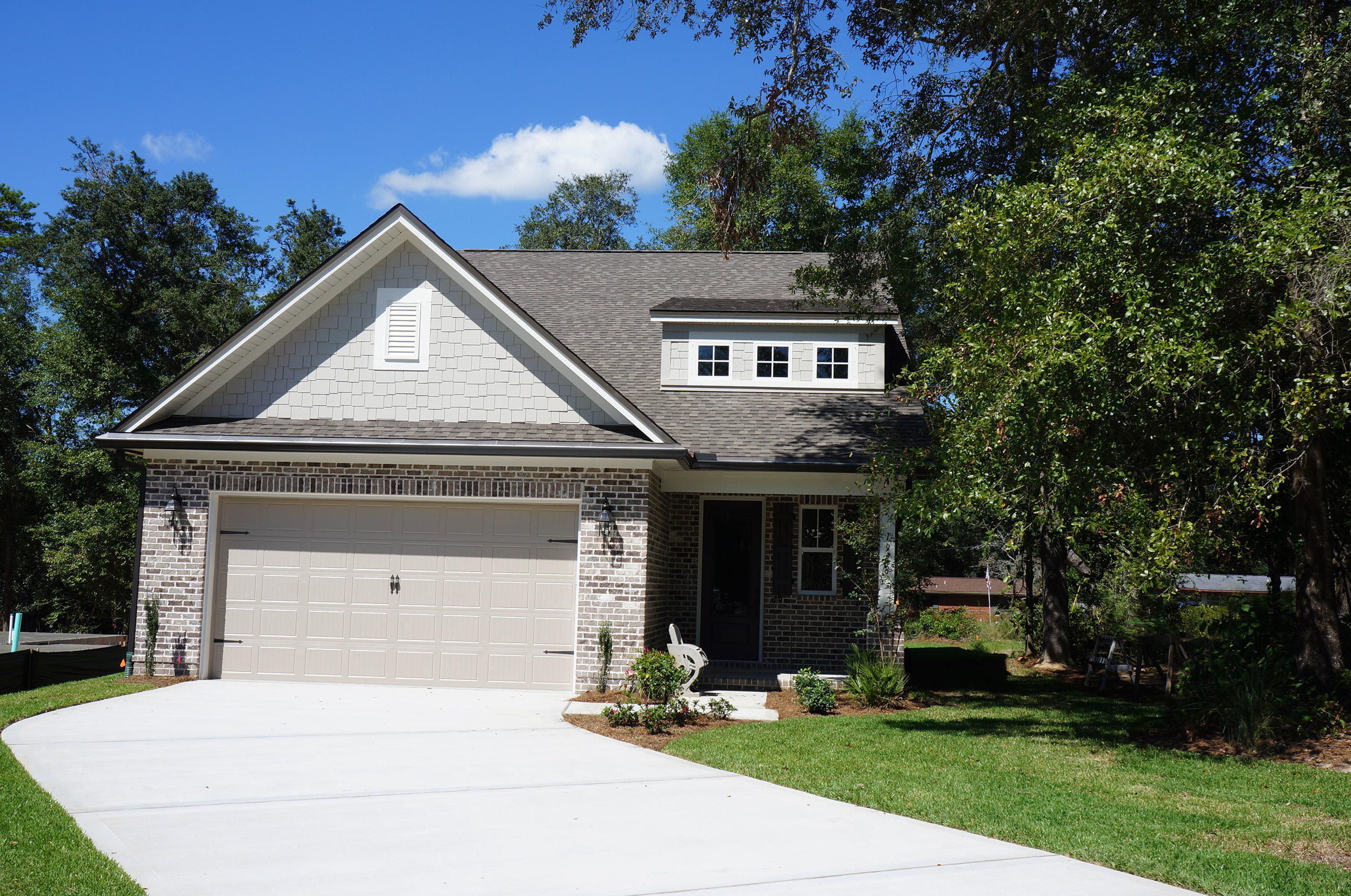 Introducing, Hattie's Grove. A new subdivision from a quality builder who has 37 years experience building in the NW Florida area. This two story cottage is 2369 sqft, 4 Bd with additional FLEX room /2.5Ba/2Ga home with the open floor plan that this builder specializes in. Attention to detail and quality is readily apparent and this house will have crown molding, 5 1/4 trim, cased windows and doorways, laminate lock-n-go flooring, tile in wet areas, 3 cm solid granite in kitchen and bathrooms, as well as raised vanities in the baths. The master suite is downstairs and has a tiled shower as well as a garden tub on tiled decking.