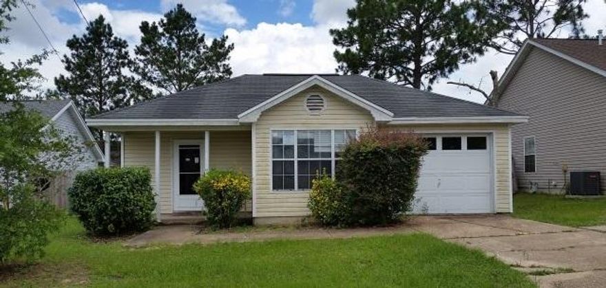 Real Estate Owned REO. Three bedroom, 2 bath home south of I-10 close to bases, schools, shopping, hospitals and amenities. This home features fireplace, fenced yard, large master bedroom. Great starter or retirement home, hard to find under 100k.