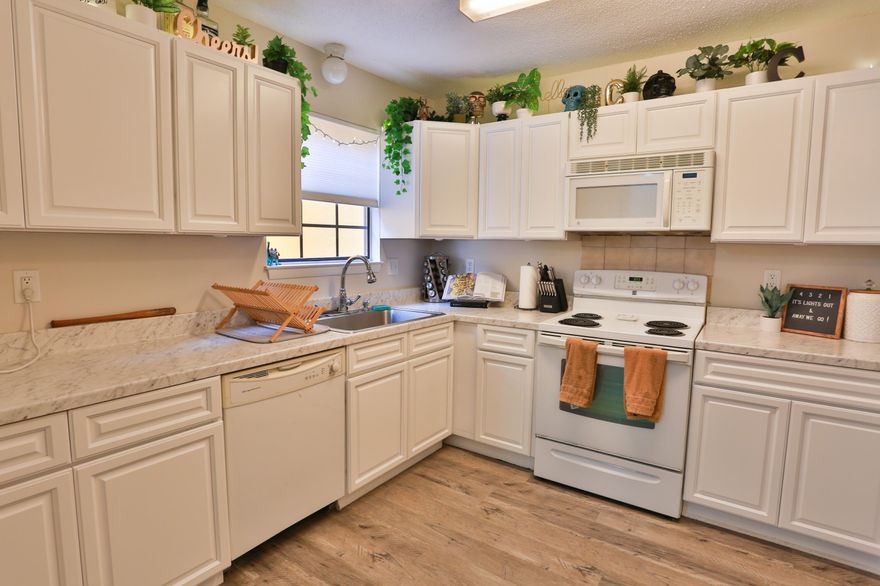 Located in the heart of Shalimar, this charming 3-bedroom, 2.5-bathroom, 2-story 1,360 square foot townhome has been well kept by the current owners which provides comfort and peace of mind. Its desirable location to both Hurlburt Field and Eglin Air Force Base makes for a great investment or primary residence. No HOA!!! Large eat-in kitchen with like new white cabinets, matching appliances, new counter tops and vinyl plank tile flooring. Spacious living room with like new carpet flooring throughout and sliding glass doors that open to a private fenced in backyard perfect for entertaining. Half bath is conveniently located off the living area. The upper level offers a large master bedroom with its own private bath. Master bath has new vanity, quartz countertop, like new flooring and shower. Two additional bedrooms and another full bath upstairs. The laundry/utility room over the patio. Plenty of closet space throughout the entire area. Home also has a full-size 1 car detached garage and ample private parking for family and guests. Home is being sold unfurnished. Make an appointment today to view this lovely place!