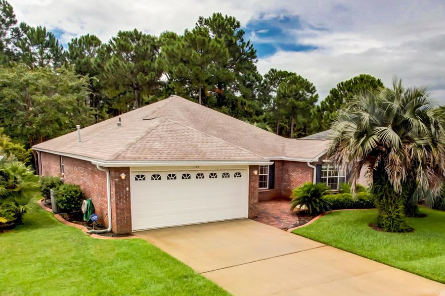 This beautiful 3 bedroom brick home sits in the centrally located yet private community of Bayside. Features include a two car garage, enclosed Florida room, screened in porch, hurricane shutters, security system, solar powered attic vent and gas fireplace. The master en suite is complete with double vanity sink, garden tub, seperate shower and large walk-in closet. Home has been recently upgraded with new roof, paint and light fixtures. Bayside has wonderful amenities that include a community dock and fishing pier, tennis courts and a swimming pool. All dimensions are approximate and should be verified by buyer.