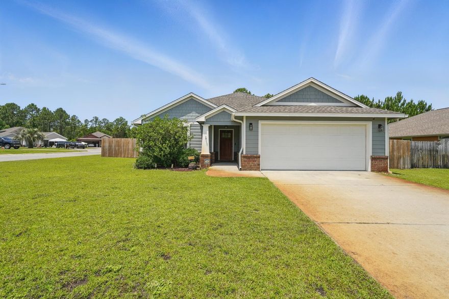 Charming, quiet, and highly desirable neighborhood in East Navarre!  This beautifully maintained Conner Lot 3-bedroom, 2-bath home offers an open floor plan with granite countertops, stainless steel appliances, and tile flooring in the kitchen and dining areas.Enjoy Well-maintained carpet install 2 years ago, adding extra comfort to the bedrooms and living space. The spacious master suite features tray ceilings, a large walk-in closet, and a Fully Renovated Bathroom with a walk-in shower and double vanity.Step outside to a screened-in back porch and enjoy the privacy of a fenced backyard with nature view. Perfect for relaxing evenings.Conveniently located just minutes from the beach, shopping, Hurlburt Field this home is the perfect blend of comfort and convenient.