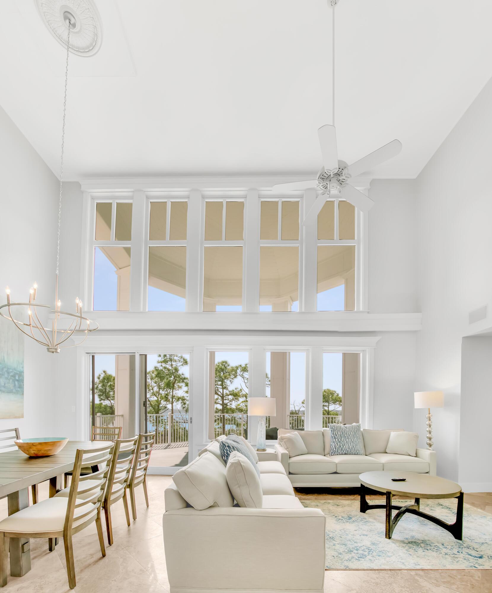 *Seller willing to offer seller financing.* This luxurious, one-of-a-kind two-story penthouse is a high-performing rental, perfect for hosting large groups. Enjoy breathtaking bay and marina views from the expansive circular balcony. Completely remodeled in 2023, it features all-new furnishings, artwork, and accessories. The updated kitchen boasts quartz countertops, new appliances, and refreshed cabinetry, while the en suite baths feature double vanities, soaking tubs, and walk-in showers. Travertine and LVP flooring enhance the elegant design. With ingress from both levels, this unique residence offers seamless access and convenience. Additional highlights include a built-in wet bar, an upstairs den and kitchenette, walk-in full size laundry room, multiple closets, and a storage cage. Lasata is located adjacent to the fabulous shopping, playground, family friendly activities, formal and informal dining and night life hot spots in the pedestrian Village of Baytowne Wharf. In addition, Hotel Effie is just a few steps away with a rooftop pool and bar and fine dining at Ovide. Owners also have access to the private Solstice Club, an amenity for owners and their guests, featuring grills, screened porch with gas fireplace, indoor bar, flat screen TV and comfortable seating inside and out.
As an introduction to the Sandestin lifestyle, we invite our new owners to explore amenities that make Sandestin special. The listing brokerage and seller(s) are presenting the buyer(s) of this property with (2) 90-minute rounds of Tennis court time, a golf foursome at one of our three championship courses, and a round of golf for up to four (4) players at the unrivaled Burnt Pine Golf Club.
Sandestin Golf and Beach Resort features more than seven miles of beaches and pristine bay front, four championship golf courses, 15 world-class tennis courts, a 226-slip marina, a fitness center, spa and celebrity chef dining. Shop, dine and play at the charming pedestrian village, The Village of Baytowne Wharf and more. Inside the gates of the resort, residents enjoy a balanced lifestyle of high-class living, spanning the 2,400 acres from the beach to the bay. Everything within the gates of the resort is accessible by golf cart or bicycle. The entire resort is interconnected by miles of pedestrian, bike and golf cart paths that weave through groves of live oaks, meandering past natural lagoons, fountains, man-made lakes, and meticulously landscaped fairways.