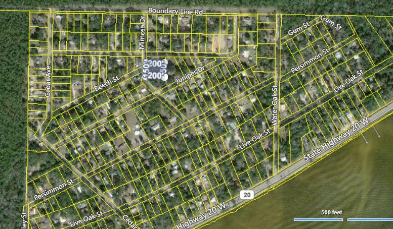 Beautiful vacant lot, centrally located lot in the desirable Choctaw Beach area of Freeport, Florida. Surrounded by mature trees and natural beauty, you'll feel a world away, yet you'll be close to shopping & dining. Situated 2 Minutes from the Bay, 26 minutes from Eglin Air Force Base and 23 minutes from the EOD school, this prime piece of land offers an exceptional location for your dream home.Less than 15 minutes from the beautiful beaches of South Walton County, this property provides the perfect balance of nature and convenience. This vacant lot is the perfect canvas to build your custom home. Selling AS IS - An old mobile home is located on the land & is deemed unsafeBuyer to verify all dates, acreage, distances, measurements and anything deemed important