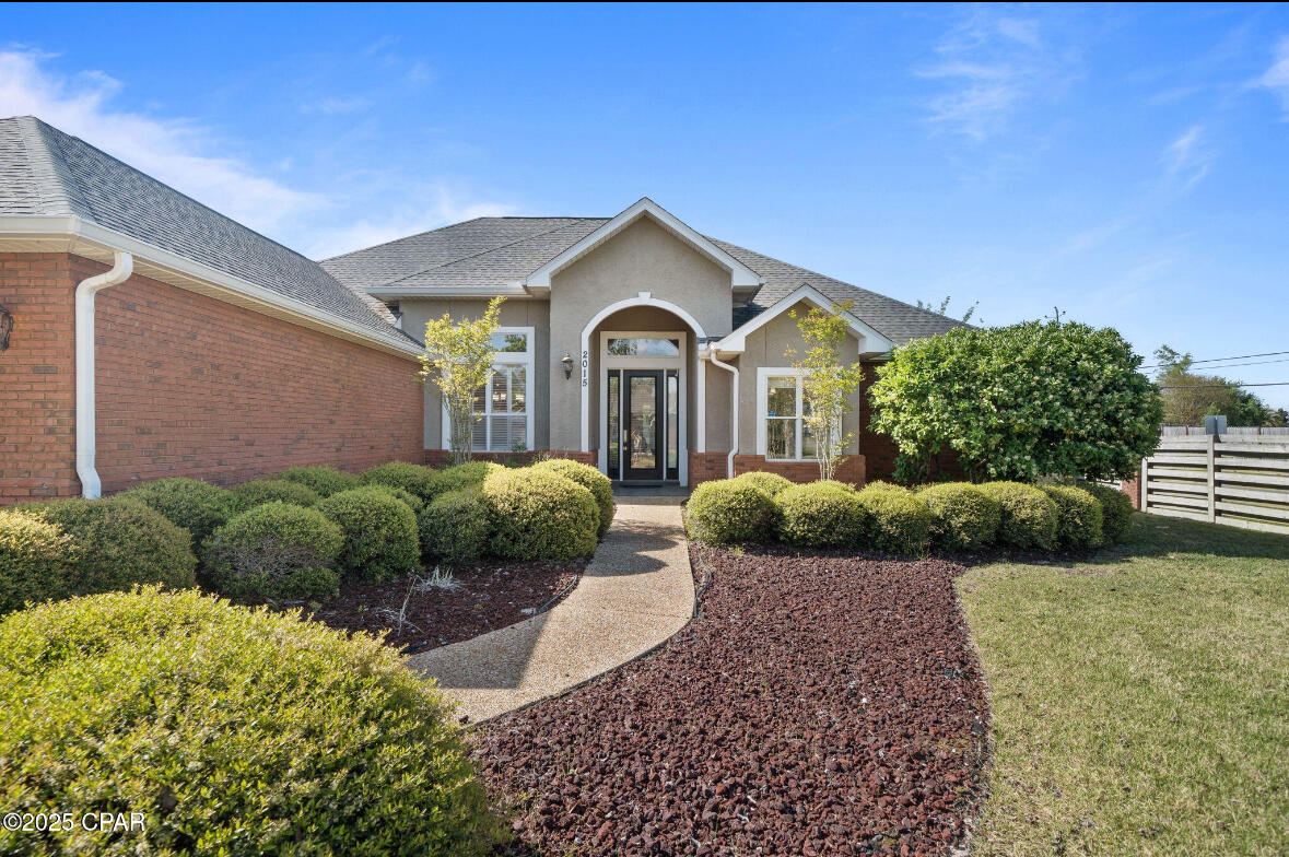 Here's your opportunity to tour this gorgeous 4-bedroom, 3-bath home, perfectly placed on a spacious corner lot in a peaceful cul-de-sac with no HOA!Inside, you'll find an inviting open floor plan featuring rich hardwood and tile flooring, crown molding, and tray ceilings that give the home a custom, high-end feel. The freshly painted interior adds a clean, move-in-ready touch.The kitchen is a chef's dream, complete with Cambria countertops, abundant cabinet space, and a generous walk-in pantry. The primary suite offers a spa-like bathroom with a soaking tub and a large walk-in closet.Enjoy the enclosed sunroom now part of the heated and cooled living space with its own mini split HVAC system for year-round comfort. It's the perfect spot to relax & entertain.