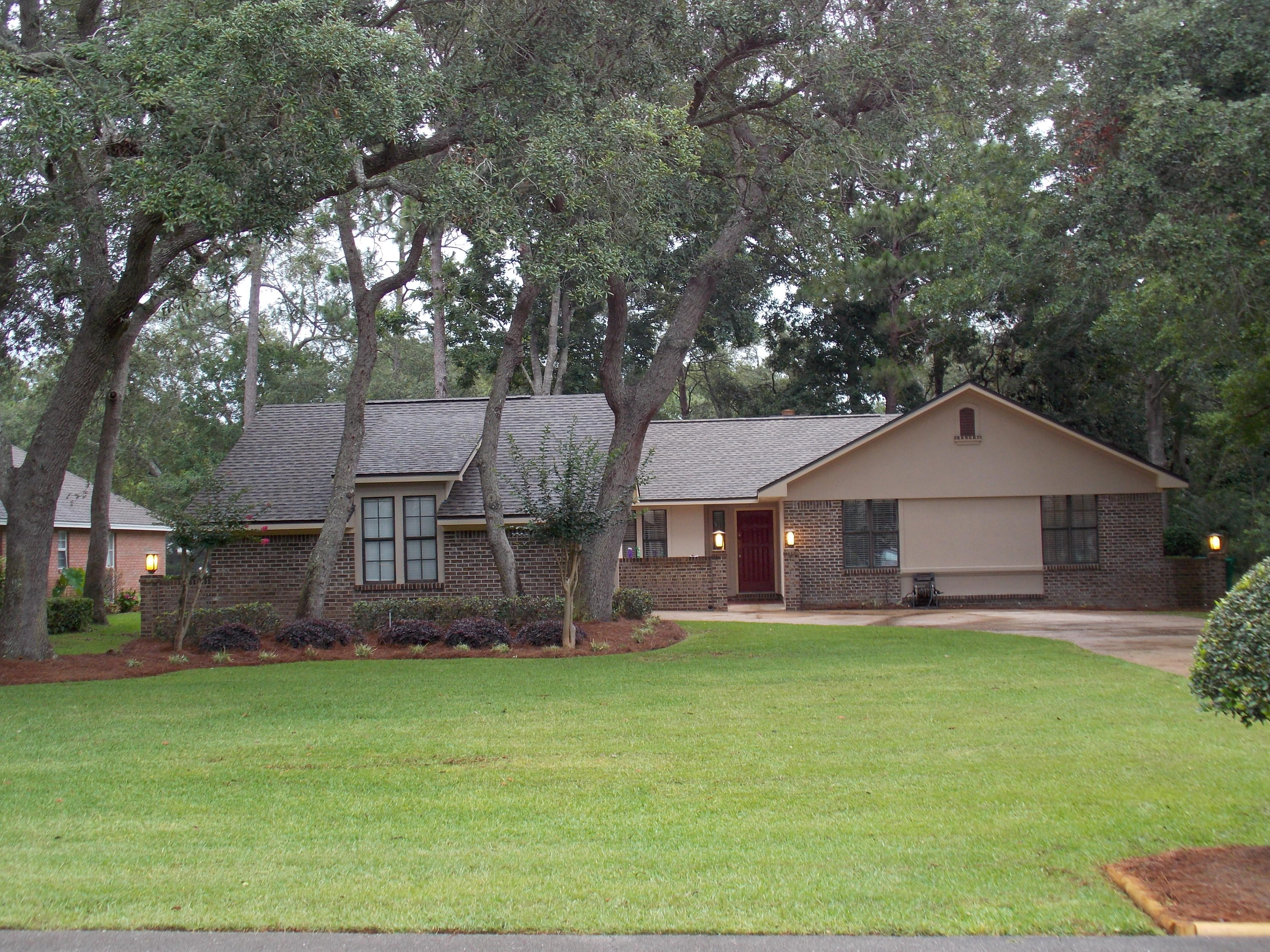 NEWLY UPDATED RENTAL includes BASIC LAWNCARE. Home is on a quiet circle in Bluewater Bay on the Golf Course. Roof is brand new and exterior features brick and stucco. Open floorpan with large living/dining area and vaulted ceiling with hardwood and tile flooring throughout except 2 bedrooms which were recently carpeted. More features include: LED recessed lighting and crown molding throughout. New kitchen cabinets with Stainless steel appliances, granite countertops, modern backsplash with LED under-cabinet lighting. Large breakfast nook and formal dining room. Florida Room faces golf course and swing set which stays. Master bedroom has a spacious walk-in closet and large, updated master bath w/ dual-bowl vanity, deep soaking tub, rain showerhead. Call today to set an appointment.