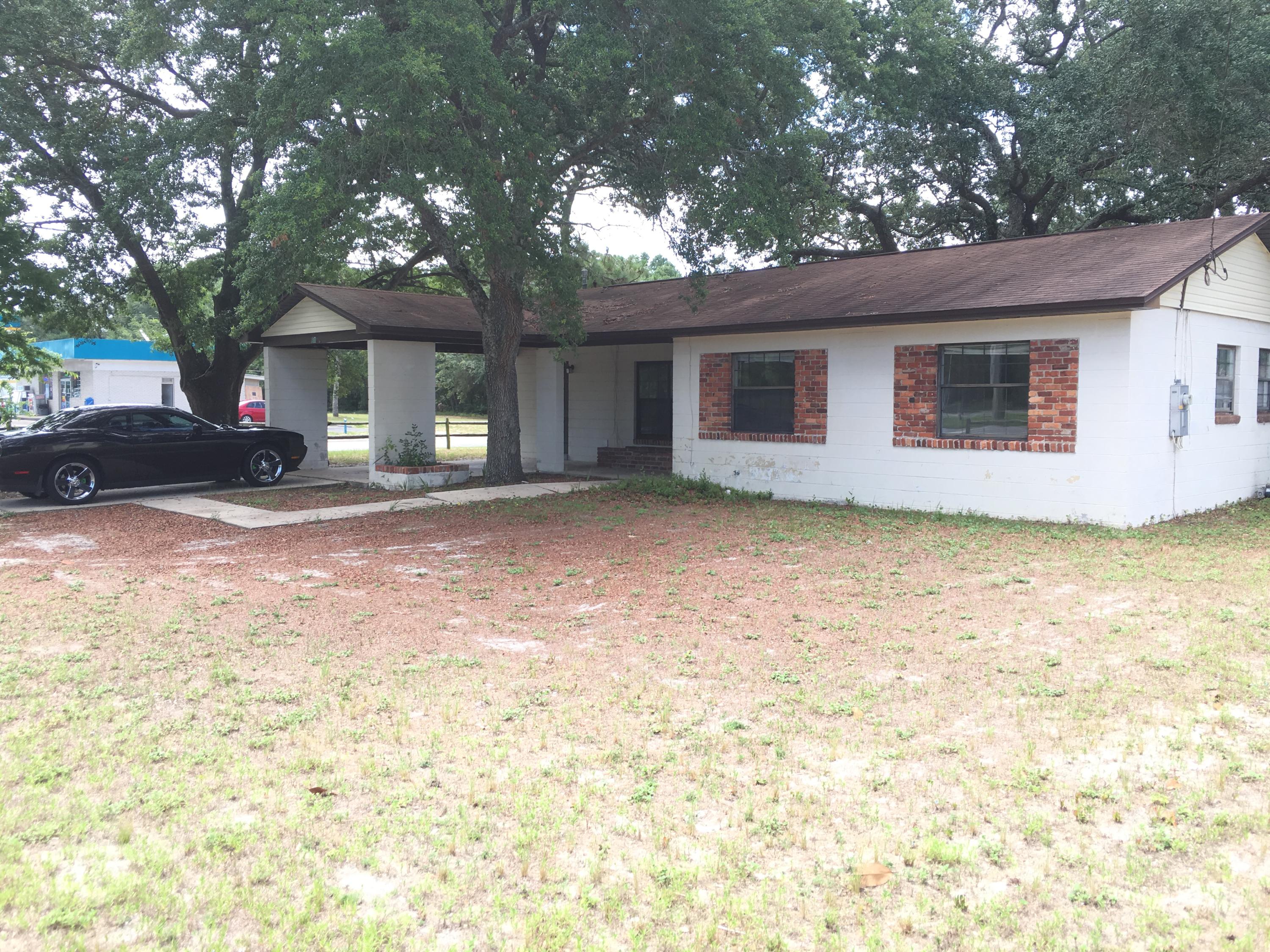 Large corner lot with mature trees for shade. Fenced back yard with plenty of room to build garage or shed. Close to Schools, shopping, parks and Water. House has great bones wouldn't take much to move right in.