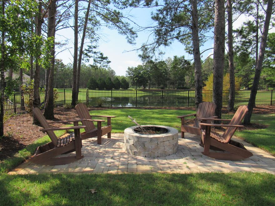 One of a kind custom floor plan in Hammock Bay! Lots of character packed into this 2125 sf home! The living room is open to the kitchen and breakfast area. You also have a flex room that can be used as a formal dining room or an office. The large master bedroom is complimented by a spacious bathroom with custom tile shower. You can access the laundry room through the master walk in closet. The other end of the house has two bedrooms and a Jack and Jill bathroom. Plantation shutters are in every window with the exception of the living area where custom shades were installed. You will love relaxing in the back yard on the screened porch or out by the fire pit! You must check this one out! Professional pictures coming soon!Buyer to verify all measurements