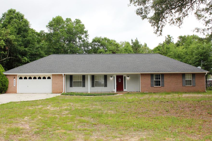 This spacious home sits on approximately 1 acre in a quiet neighborhood conveniently located. This home boasts vaulted ceilings, separate dining room with fireplace and adjoining sun room, and plenty of storage. Each bedroom is graciously appointed and has large walk-in closets. Oversize garage also has a large, bonus work room for the DIY-er or the crafter. This move-in ready home has a new HVAC, approximately 1 year old, and has been professionally painted and cleaned.