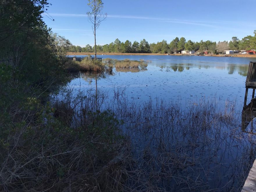 A 1.19 Acre with 65 Feet of waterfront on the Lake. Minimum 850 square foot home required. Water and electric available to lot, will require septic for sewage. Quiet neighborhood, great for second home or live full time. On paved road and wooded so you can select location for house and keep your privacy. One of the least expensive waterfront lots available on Imperial Lakes.