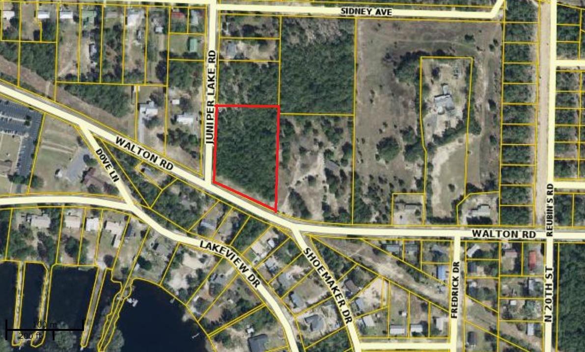 Best location in town. Almost 2.5 acres on the corner of Walton Rd and Juniper lake Rd. Property is wooded with gorgeous hardwood trees. It has 288 ft of frontage on Walton and 340 ft on Juniper Lake Rd. Huge development potential or an amazing estate home location. Located in the City Limits and and walking distance to Maude Sanders, Walton High, Wee Care Park, Juniper Lake Park and boat ramp, and Lake Stanley Park and boat ramp and less than an hour to the beach. Seller has new survey.