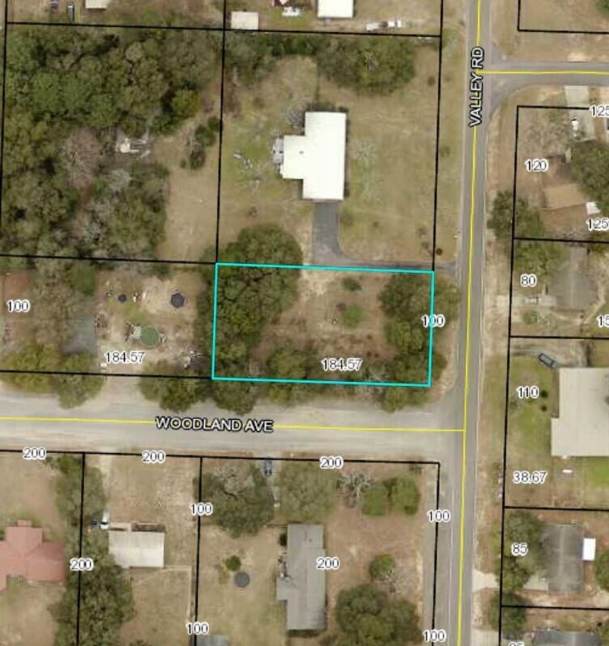 A spacious lot for your  new home!  Per Okaloosa county single family home or mobile home is allowed with associated structures such as garage, workshop, shed or pool.  The lot has been cleared of vegetation over growth and trees.  Septic tank has been removed and water meter located.  New fence north and west side of lot.  Buyer to verify lot size and zoning with county.