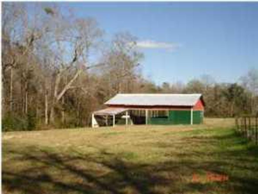 Farm Property With Large Fenced Pasture, 4 Stalls Barns With Work And Storage Area And Fenced Corral Attached. Previous Home Site With All Utilities Available.