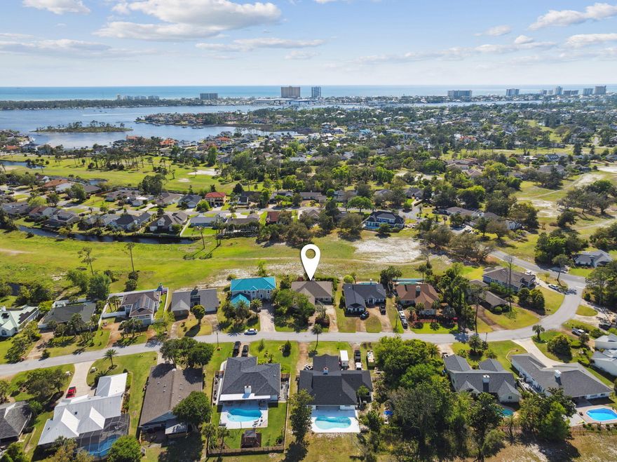 **608 Amberjack Drive | Bay Point**Three-bedroom, two-bath home located in Bay Point, a gated golf course community with tennis courts and a full-service marina. This home has been recently updated with fresh interior paint and new flooring throughout. Additional features include a private hot tub and an open floor plan. Bay Point is a secure, established neighborhood with 24-hour security and access to golf, tennis, boating, and dining. This home offers a practical layout and low-maintenance living in one of Panama City Beach's most recognized communities.