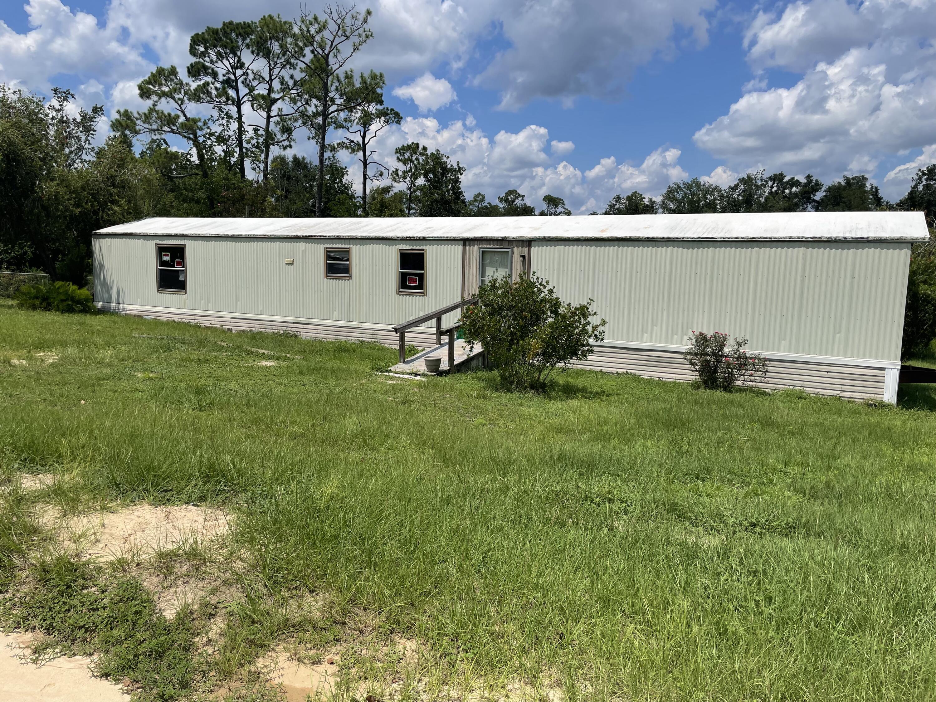 Investor Alert! If you are looking to personalize your new home and build instant equity, this open canvas could be the one for you. Single wide Mobile Home, split floor plan and very spacious open concept Kitchen/Living area in need of TLC. Over half an acre waterfront lot. Fish from your own back yard or get the kayak out and spend the day on Fanning Bayou. Motivated seller, ALL reasonable offers will be considered. Room measurements are owner provided. Sold AS IS, where it is.