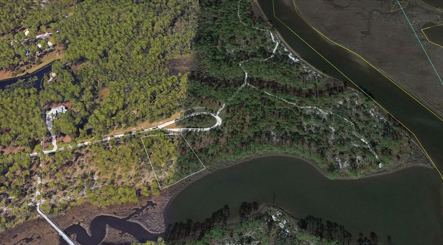 Find your pristine, private paradise while still living less than 10 miles from both our white sandy shores and the NorthWest Florida International Airport! RiverCamps offers abounding natural beauty and a quiet lifestyle, yet also offers first class amenities and keeps you conveniently close to beautiful Panama City Beach and all its attractions. This large lot sits on a bayou just off of the bay, and allows for a private boat slip and dock. The incredible recreational center is just one mile away, and features a fitness center, pool, spa, indoor and outdoor lounge areas, full kitchen, and ample space for entertaining or relaxing. A pier stretches out into the bay, offering the perfect sunset location. Or, launch your boat using the community boat ramp and watch it from the water. (More)