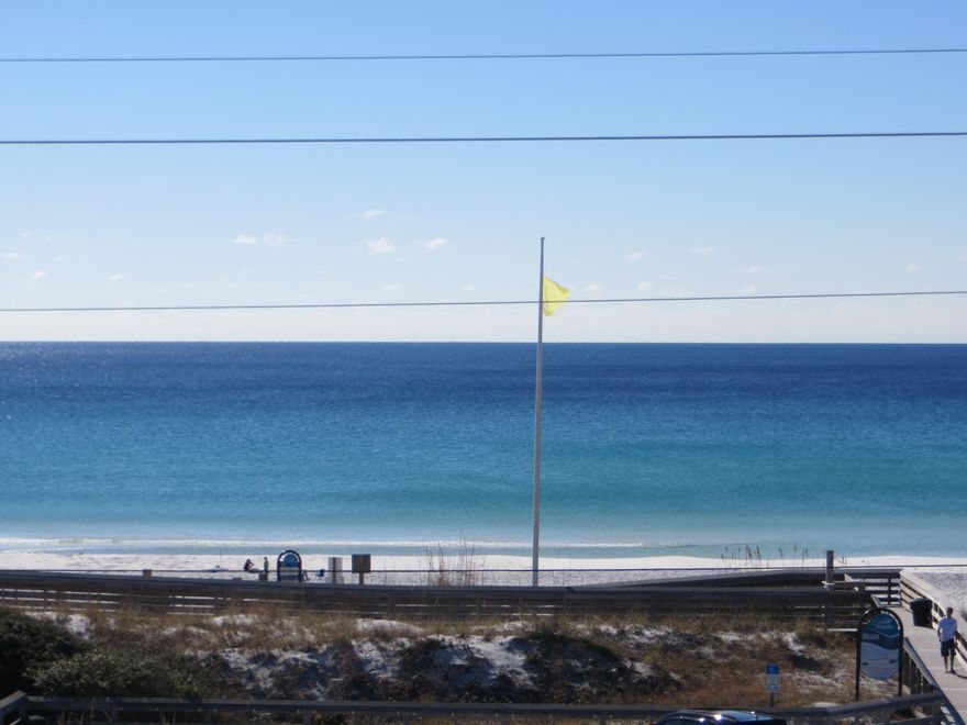 Directly on CR-30A north side. Forever unencumbered views of gulf to the south of the home (can see the waves hit the sand from the third floor) and Coastal Dune Lake to the north of the home.