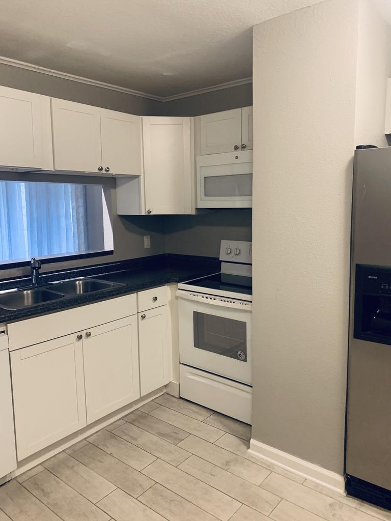 Spanish Villa Condos - Residential