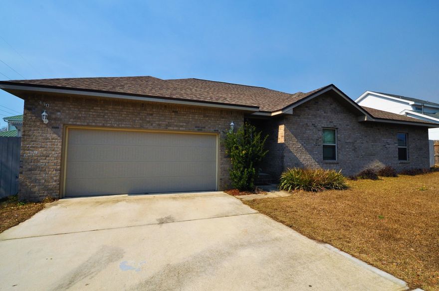 **Under Contract accepting back up offers with 72 kick out clause** Newly built all brick home waiting for the perfect family. 4 bedroom 2 bath with open floor plan, granite counter tops in kitchen and bathrooms, stainless steel appliances, great lighting, and walk-in closets in bedrooms. Master Bath has frameless glass shower and garden Jacuzzi tub. View of the sound from kitchen. 2 car garage with 220v power outlet. Pergola deck out back and newly built shed in yard. Located very close to Hurlburt Field. Deck and fence painted with 10 year sealant paint. Privacy fence 3/4 of the way around with chain link fence enclosing area perfect for animals. Concrete underneath back fence and most of the enclosed area to prevent pet loss.